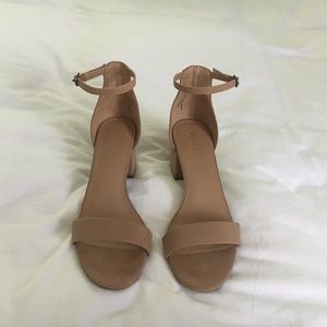 NUDE block heel sandals.